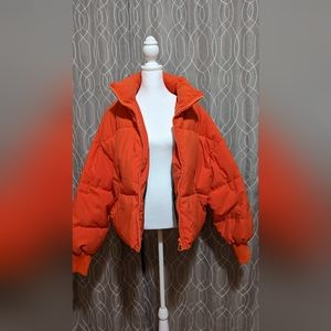 Orange puffer jacket